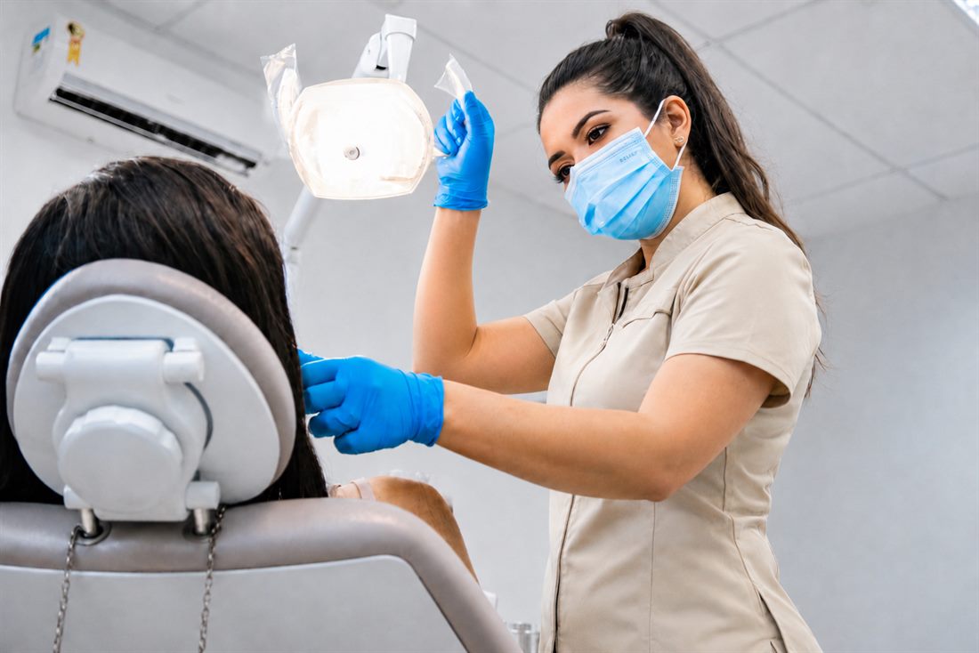 Dr. Sergeeva treating a patient at White Dent clinic